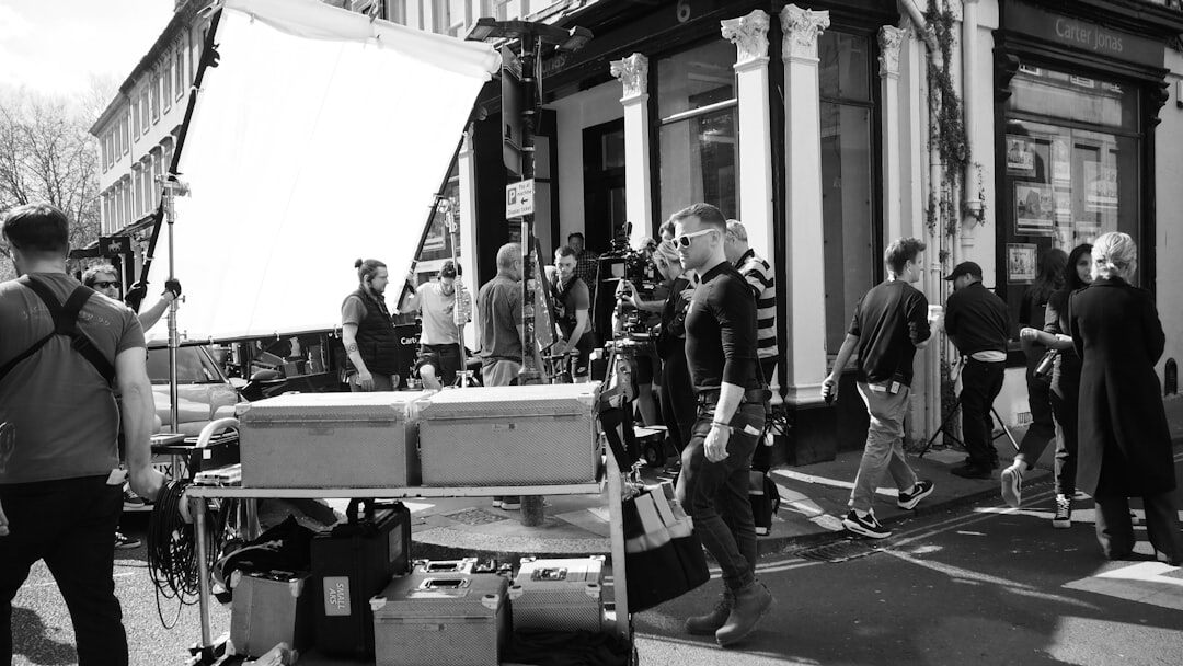 Outside broadcast van with satellite dish and camera crew
